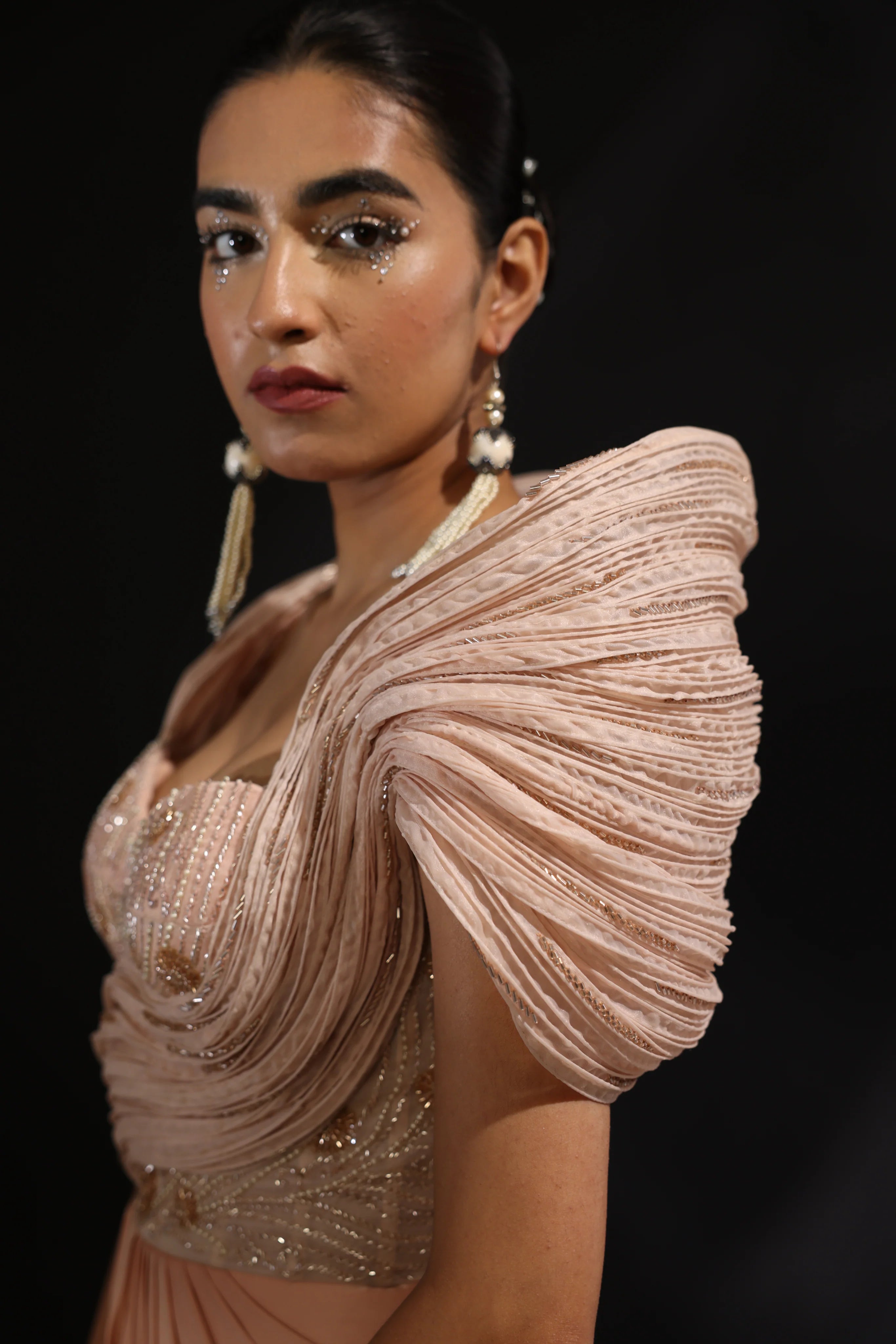 Peach Embroidered Sculpted Draped Saree