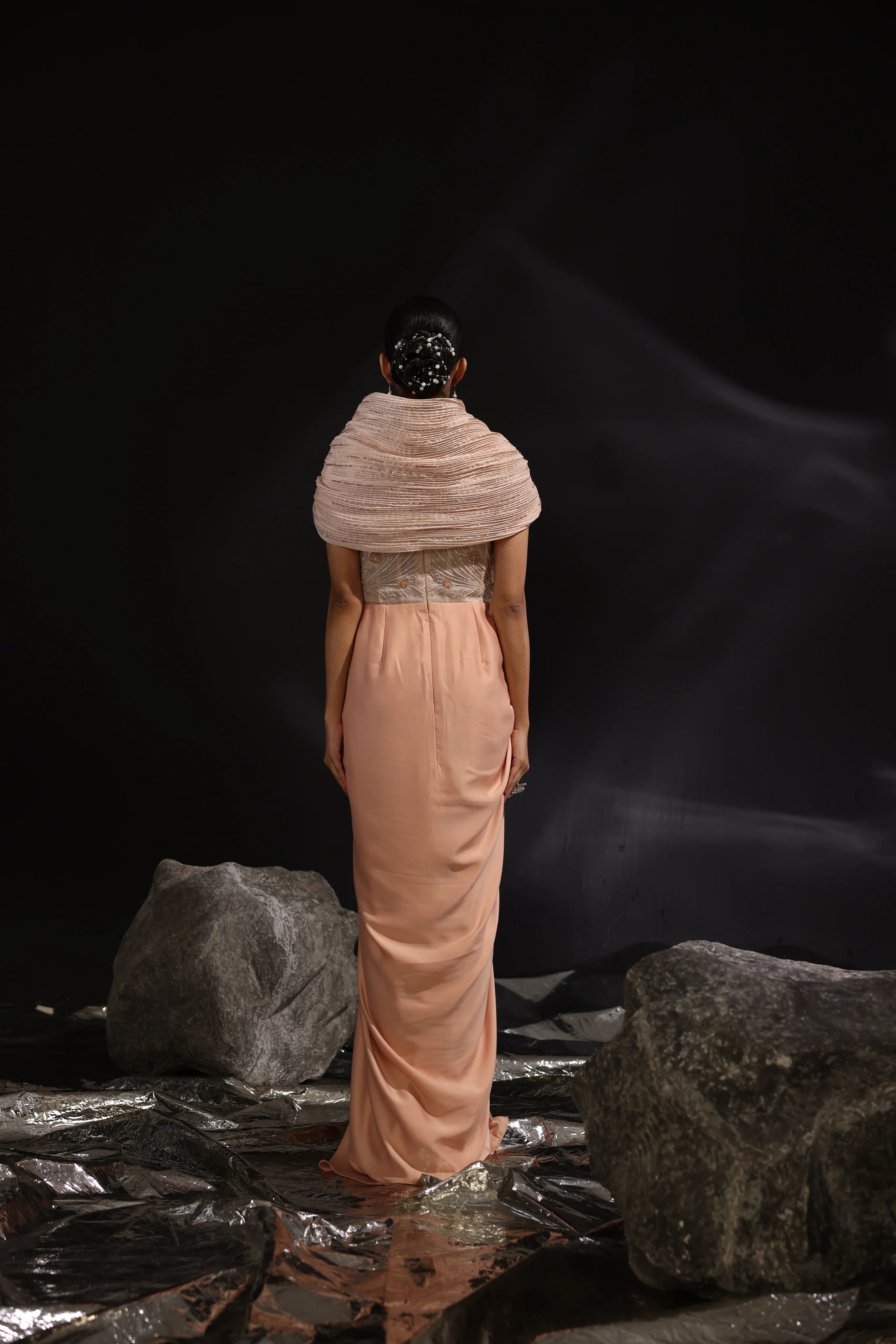 Peach Embroidered Sculpted Draped Saree